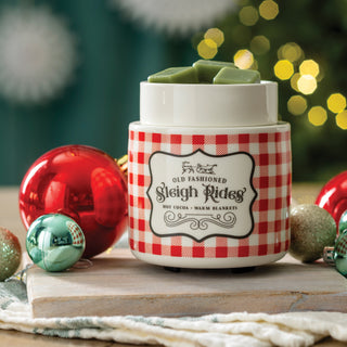 A red plaid design on white melter with "old fashioned sleigh rides" in text on the front